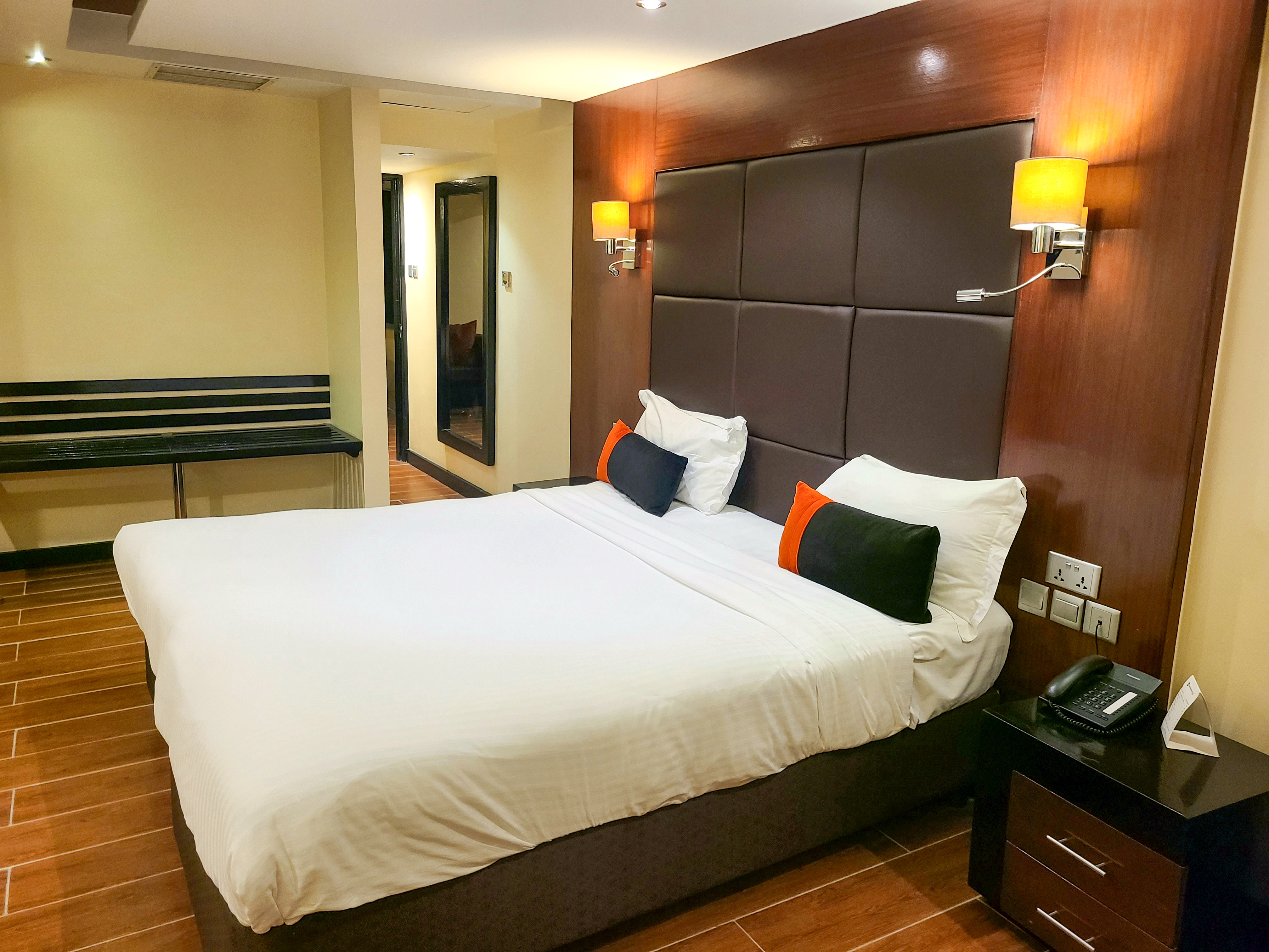 King Suite interior featuring a bed and kitchenette area